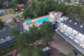 Nette Wohnung in Poddbie mit Garten, Grill und gemeinschaftlichem Pool und Strand in der Nähe, Poddąbie
